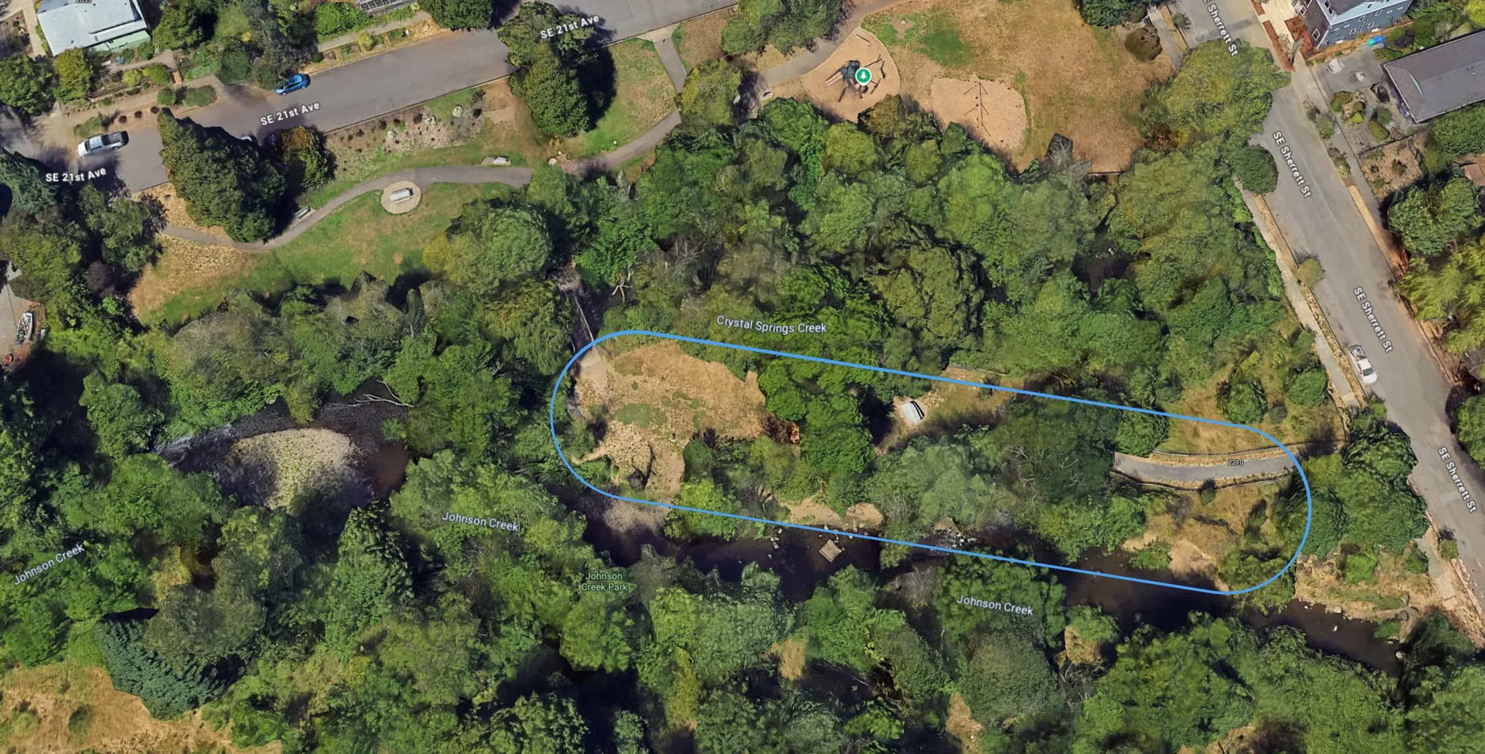 Aerial view of Johnson Creek Park with the proposed study area outlined in blue
